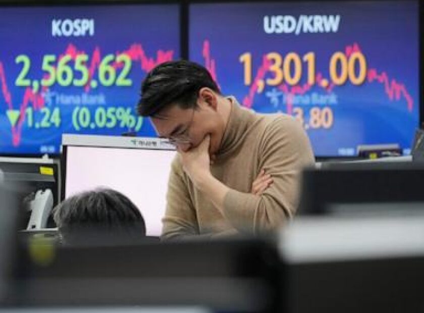 Stock market today: Asian shares mostly lower as Bank of Japan meets, China property shares fall